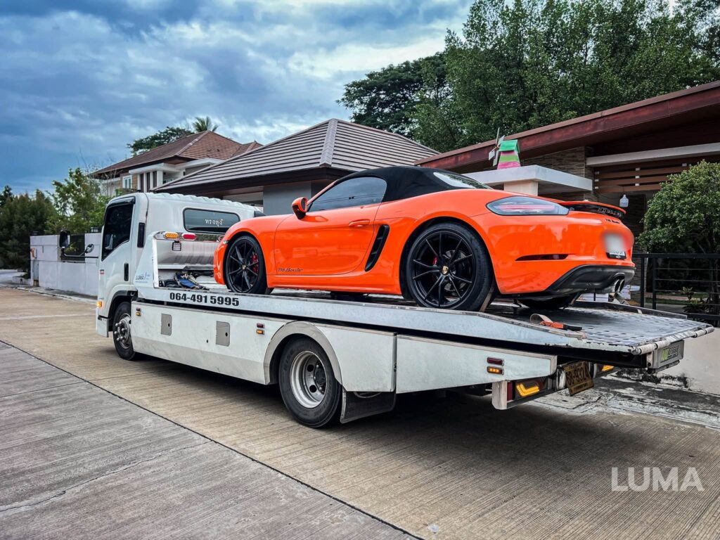 รถสไลด์กรุงเทพ LUMA ขนย้าย Porsche สีส้ม