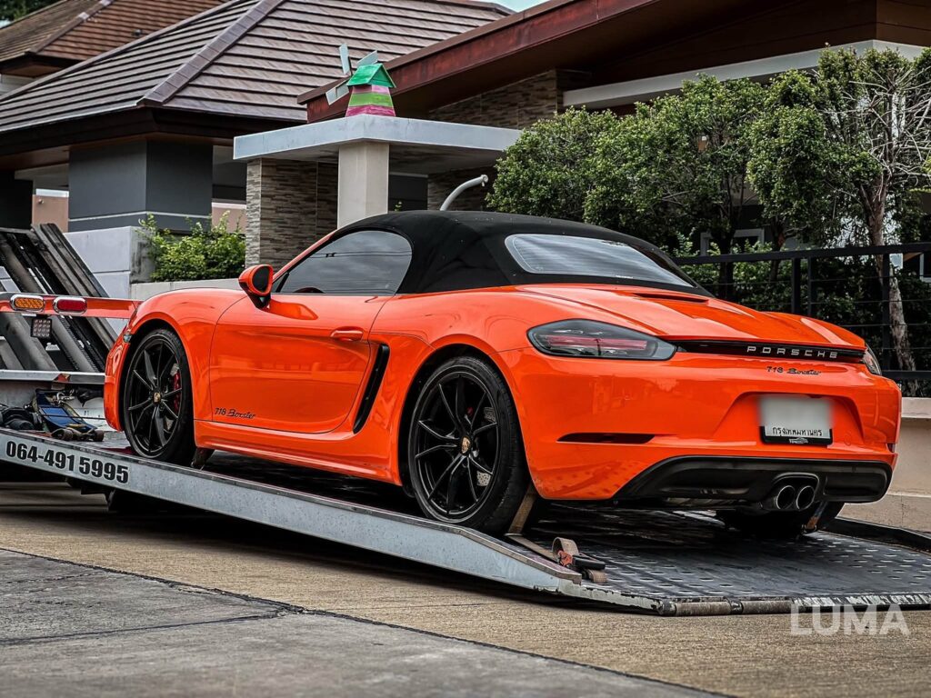 รถสไลด์กรุงเทพ LUMA ขนย้าย Porsche สีส้ม